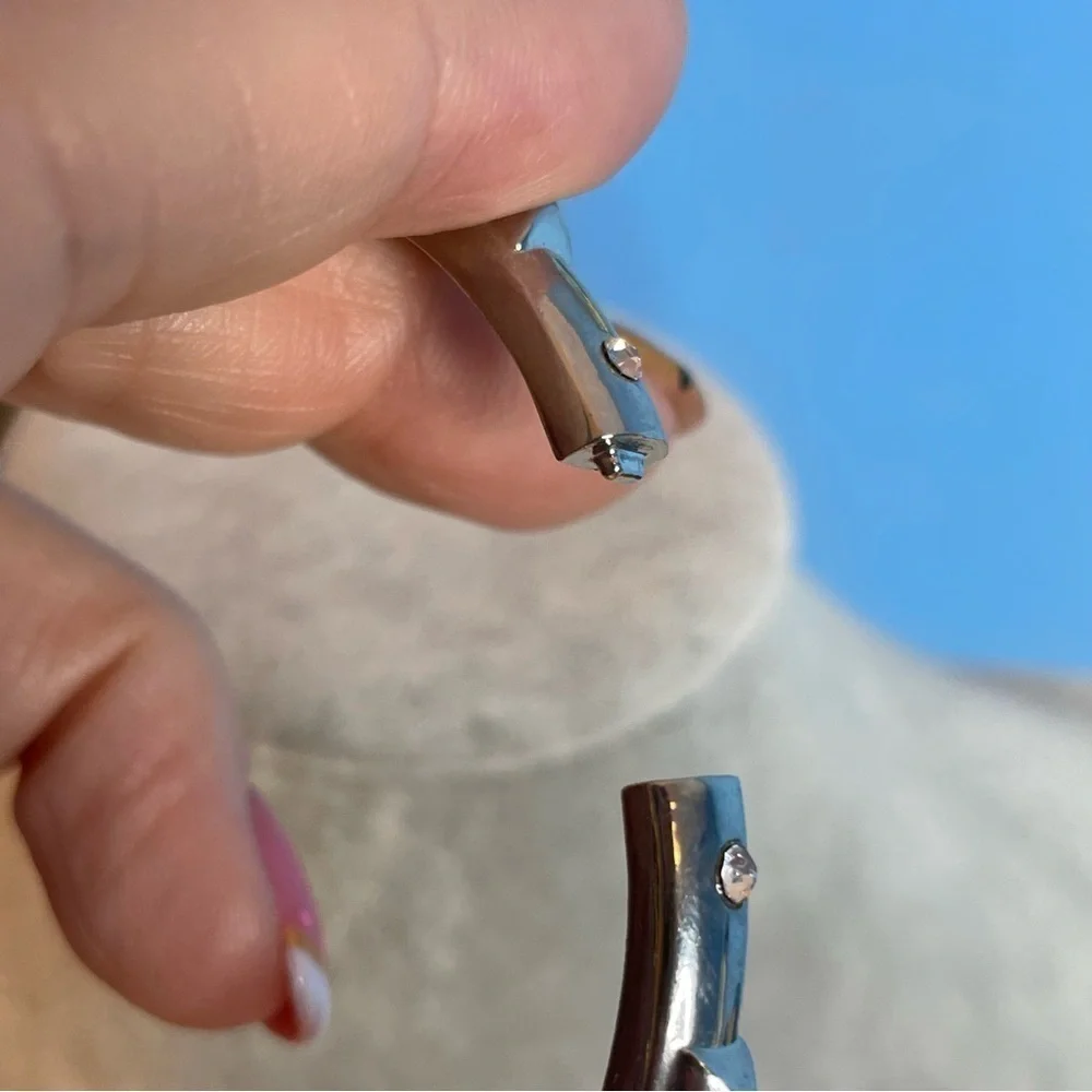 Hinged silver tone bangle bracelet with dog collar spikes and clear glass - Picture 5 of 6